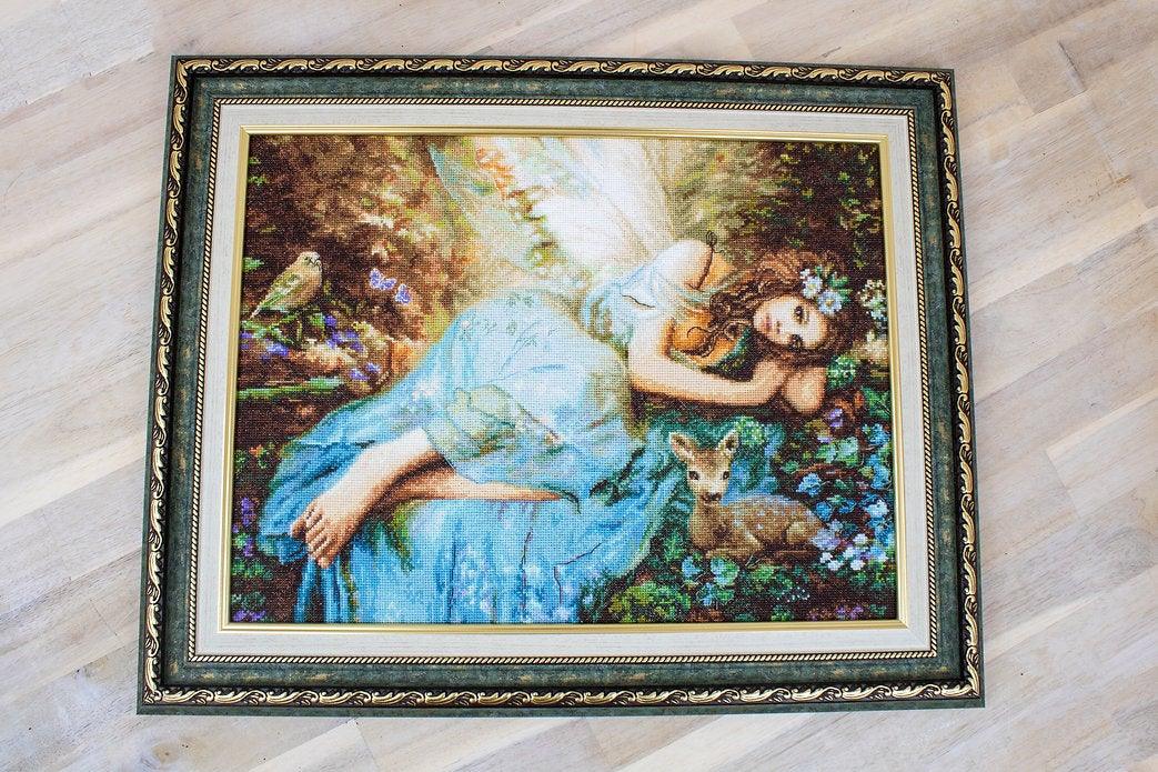 Counted Cross Stitch Kit Spring Fairy Leti960 featuring vibrant threads and canvas for crafting.