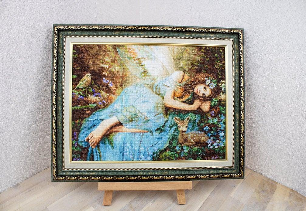 Counted Cross Stitch Kit Spring Fairy Leti960 featuring vibrant threads and canvas for crafting.