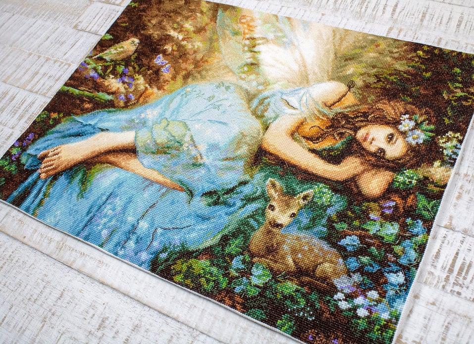 Counted Cross Stitch Kit Spring Fairy Leti960 featuring vibrant threads and canvas for crafting.