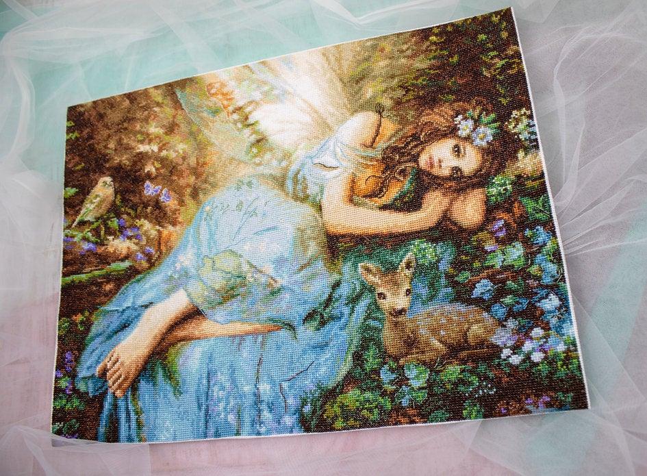 Counted Cross Stitch Kit Spring Fairy Leti960 featuring vibrant threads and canvas for crafting.