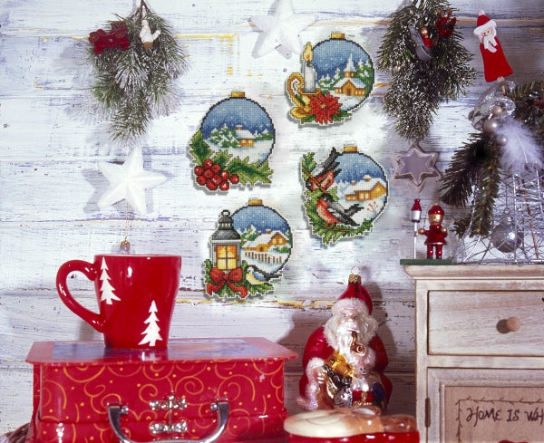 Counted cross stitch kit featuring Christmas balls with plastic canvas, DMC cotton, and stitching supplies.