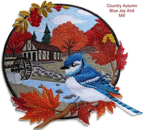 Embroidered patch featuring a blue jay and a mill, showcasing autumn colors and intricate details.