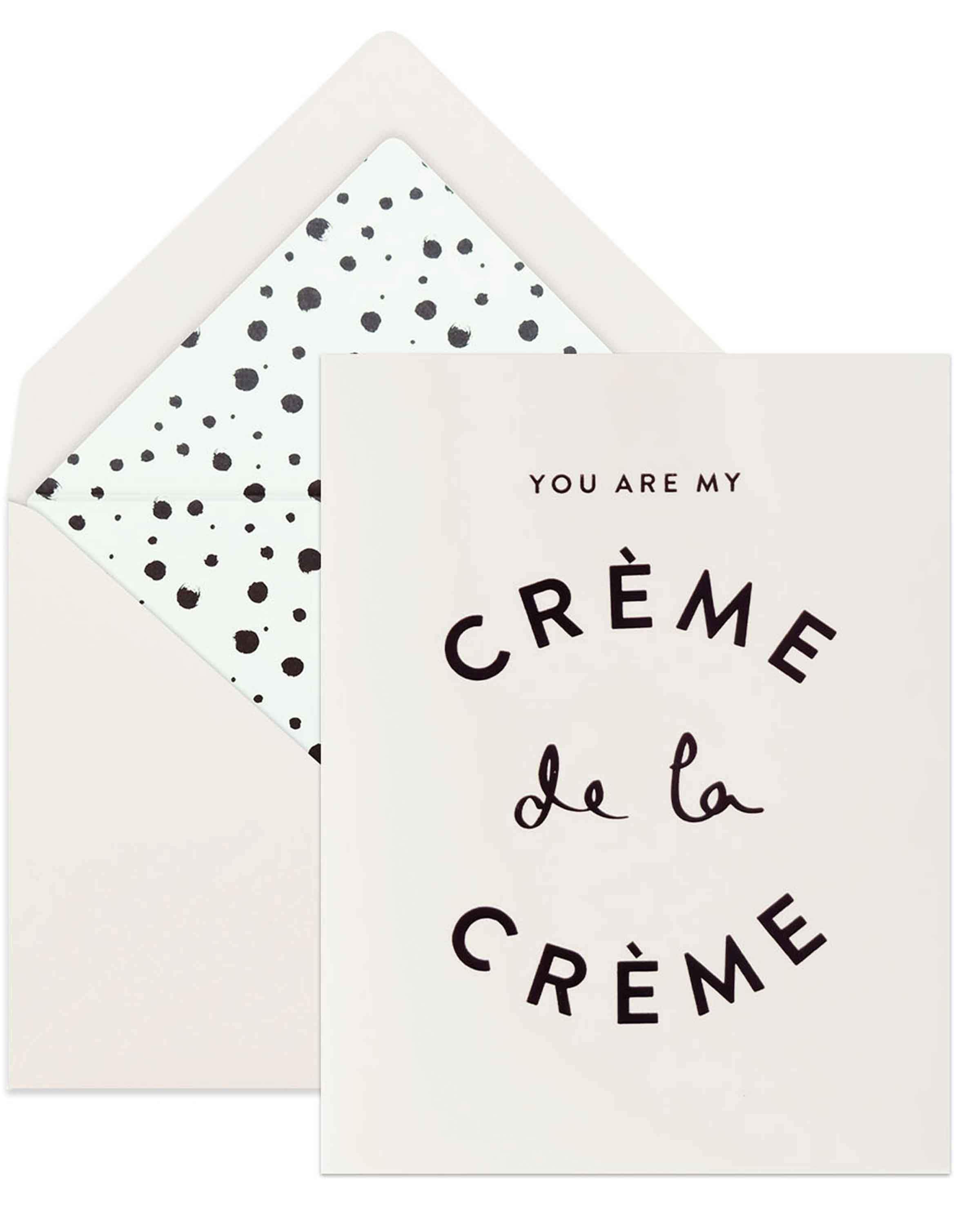 Creme De La Creme card with black foil accents and lined envelope, elegantly folded with blank interior.