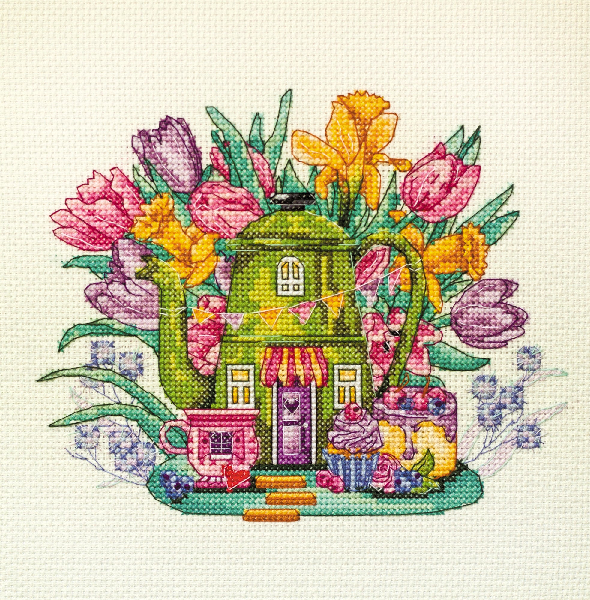 Cross-stitch kit featuring berry cupcakes design with cotton canvas and colorful floss.