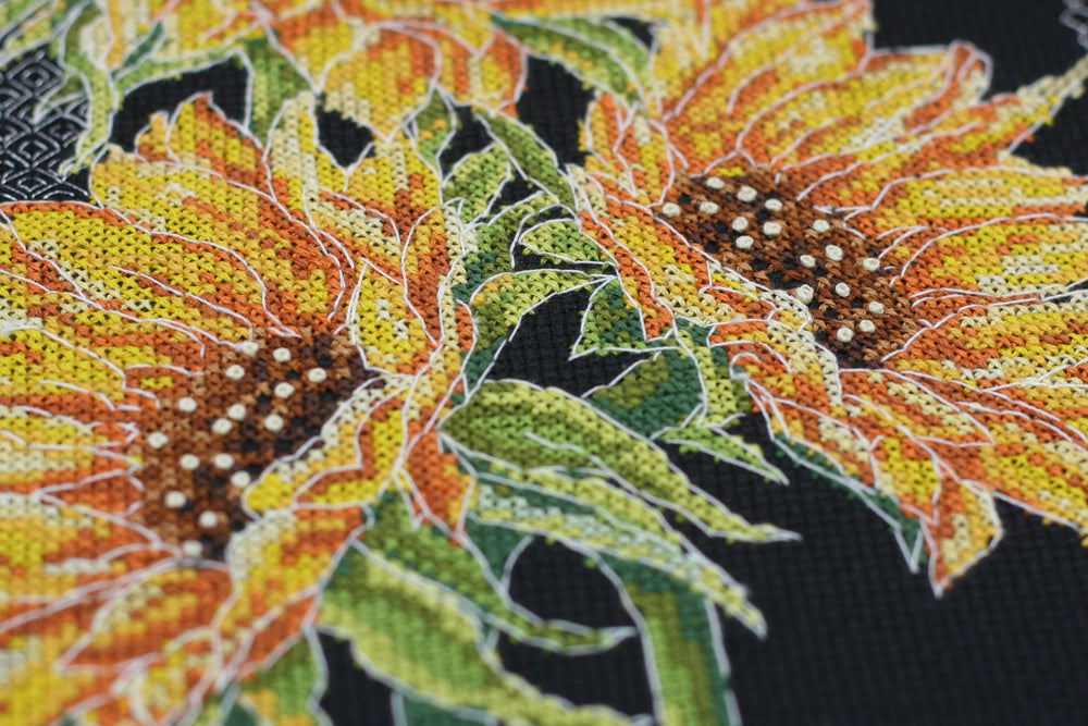 Bright Sunflowers Cross-Stitch Kit AH-159 featuring colorful threads and black canvas.