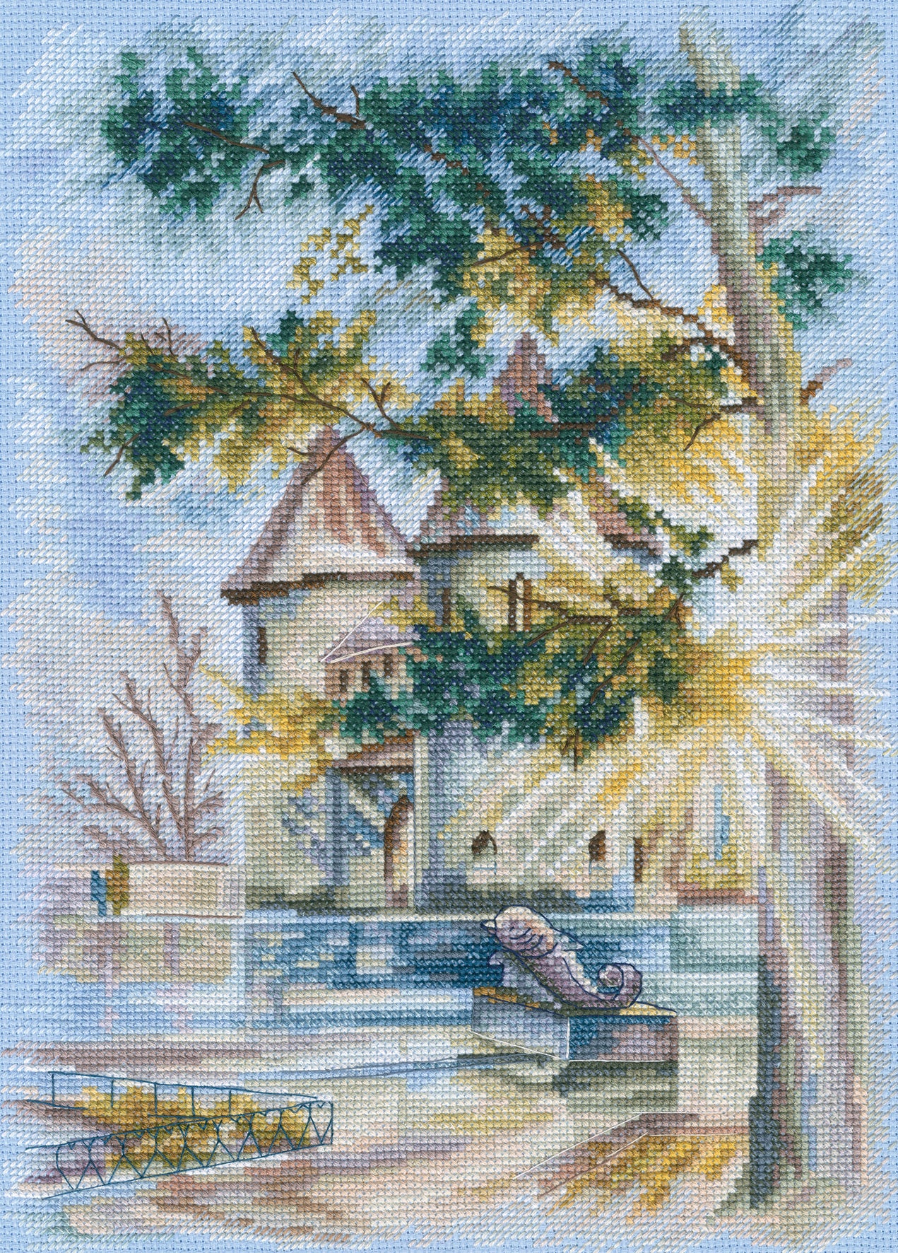 Cross-stitch Kit 'January Sun' M874 featuring light blue Aida canvas, DMC threads in 50 colors, and included needle and instructions.