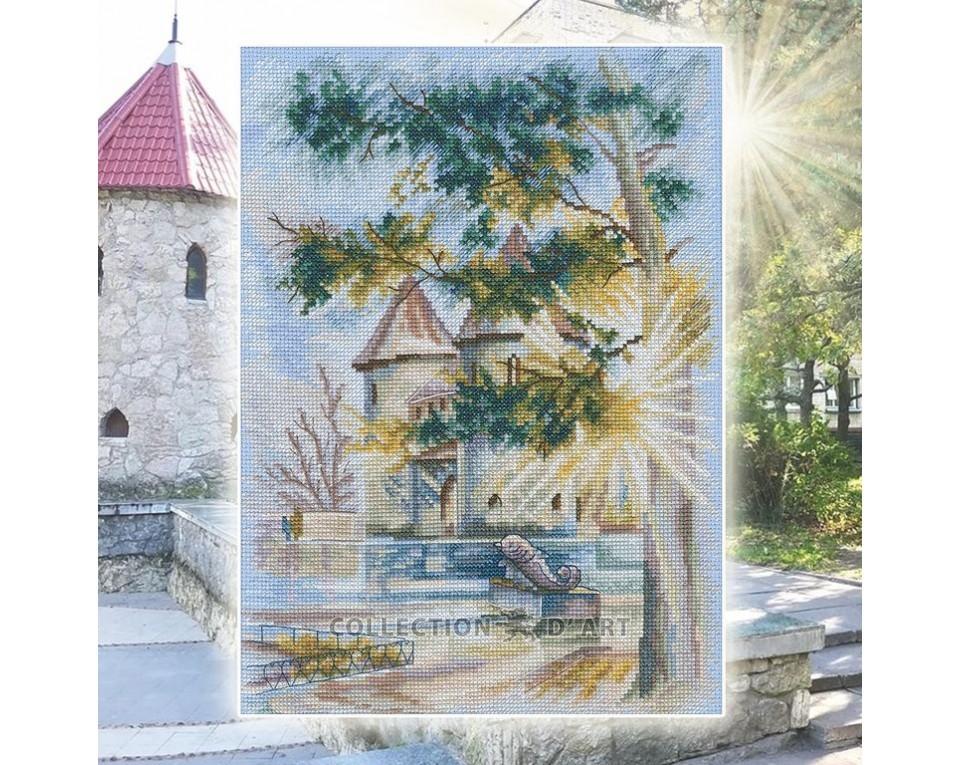 Cross-stitch Kit 'January Sun' M874 featuring light blue Aida canvas, DMC threads in 50 colors, and included needle and instructions.