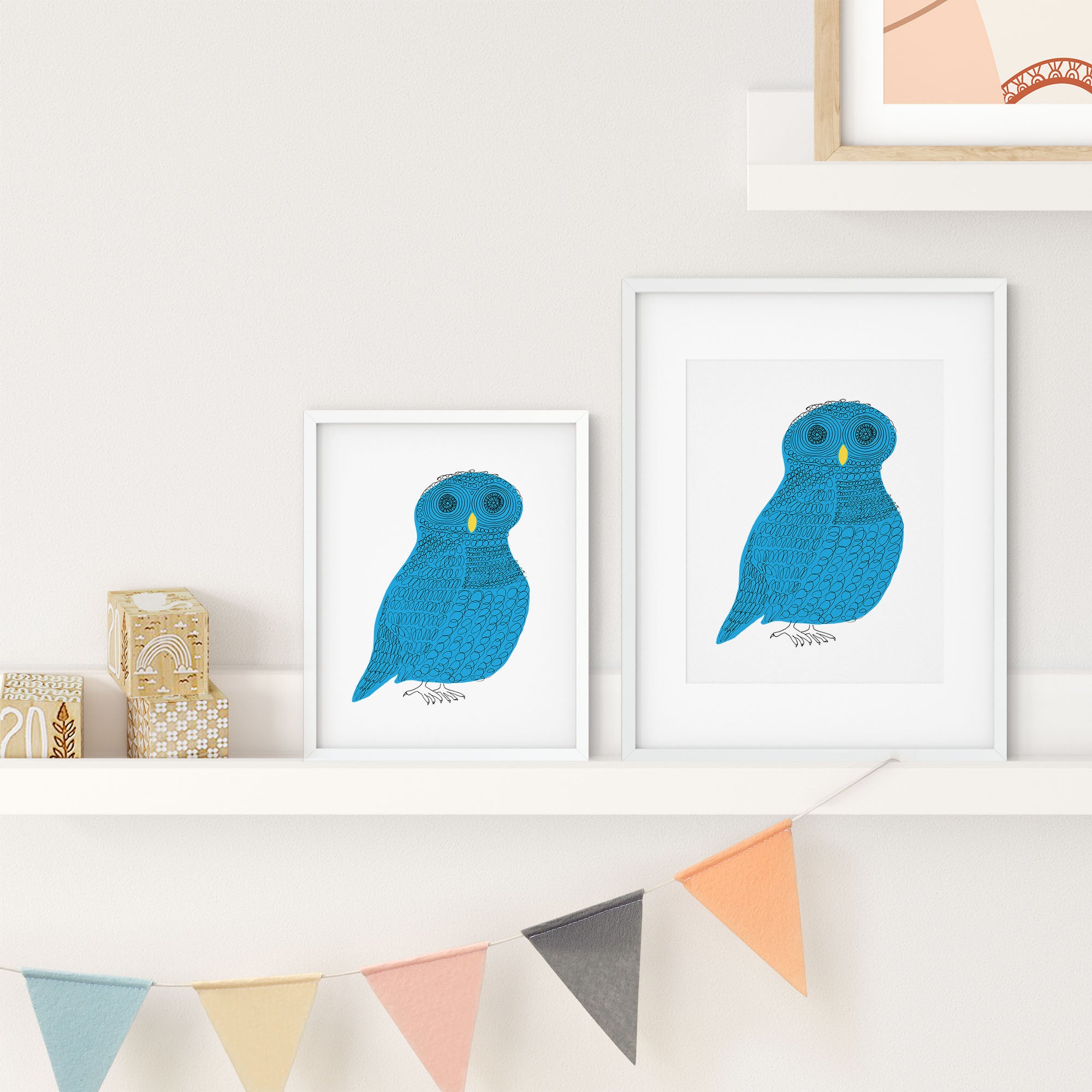 Curly Owl print featuring a playful blue owl with curls and coils, beautifully illustrated and ready for framing.