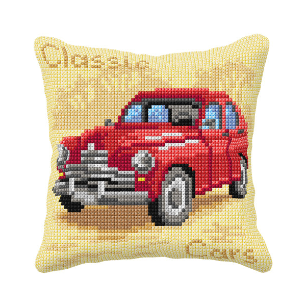 Cushion cross stitch kit featuring a red car design with printed canvas and colorful yarn.