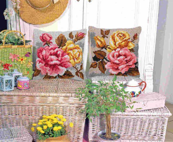 Cushion cross stitch kit featuring roses on a grey background, includes printed canvas, acrylic yarn, needle, and instructions.