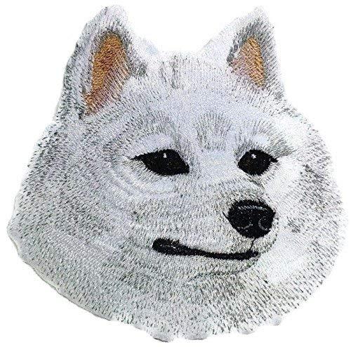 Custom American Eskimo Dog face embroidery patch, showcasing intricate details and vibrant colors, perfect for iron-on or sew-on applications.