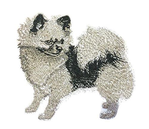 Custom Chihuahua embroidered patch on a garment, showcasing vibrant colors and intricate details.