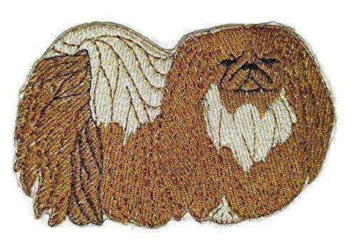 Custom Pekingese dog embroidery patch, showcasing intricate stitching and vibrant colors on a cotton base.