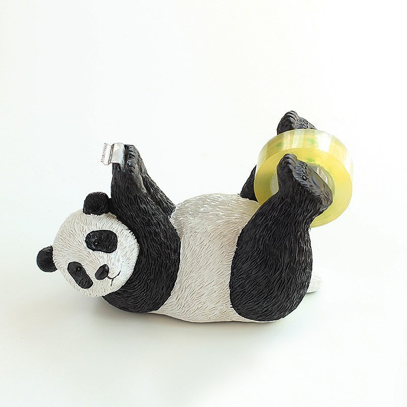 Panda-shaped tape dispenser holder.