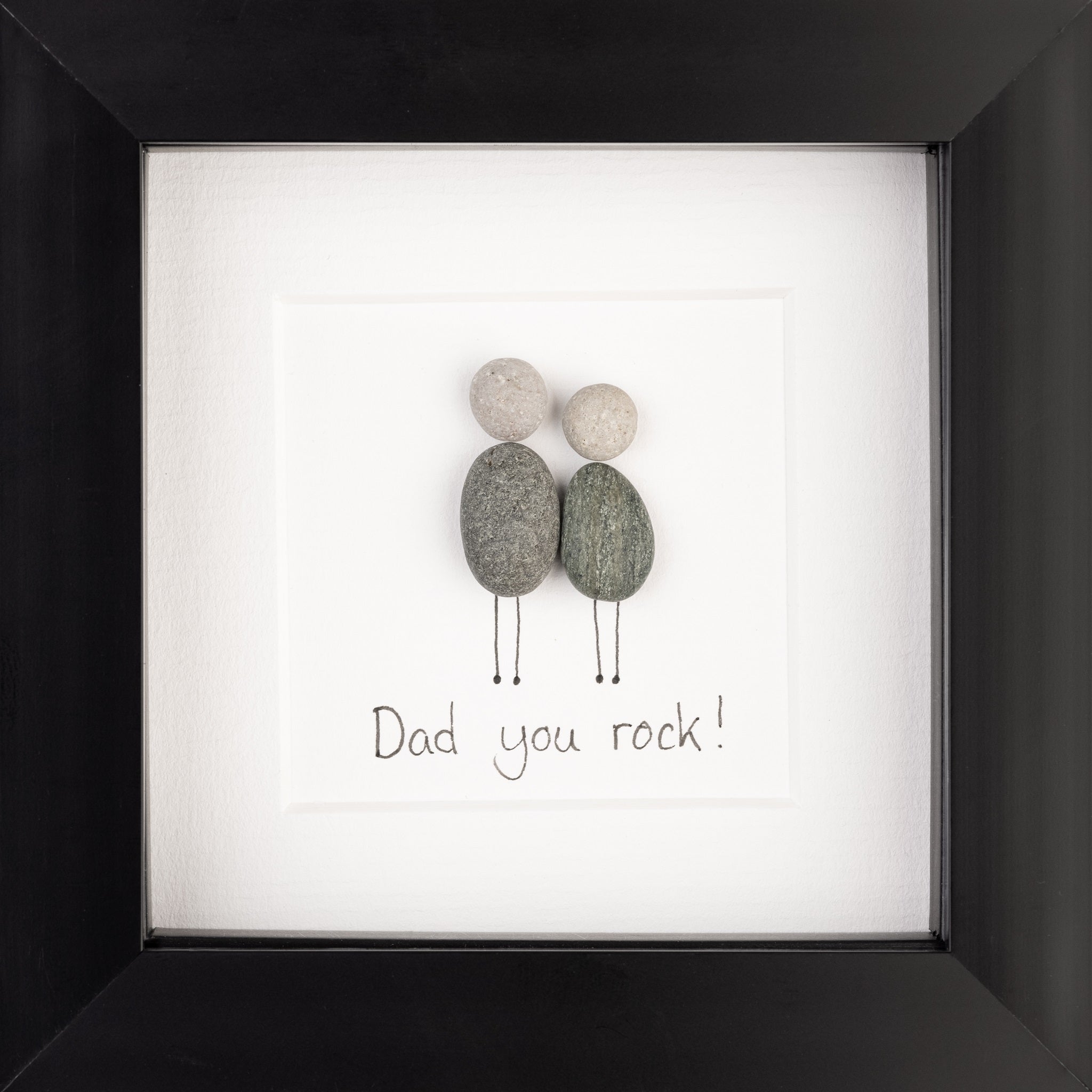 A stylish pebble picture framed in black or white, celebrating dads with the phrase 'Dad you are my rock!'