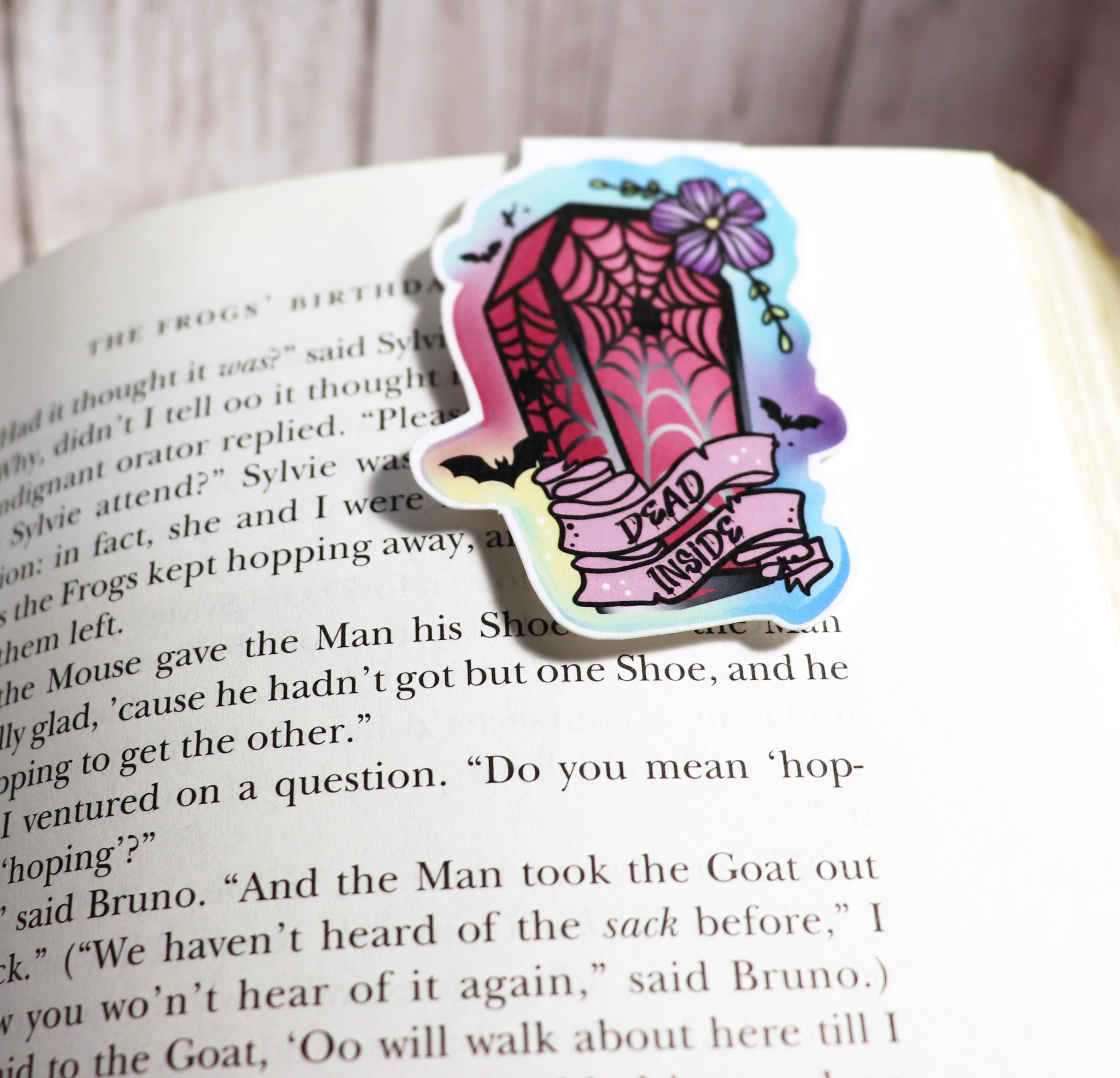 Dead Inside Coffin Bookmark featuring a unique coffin design, scratch and splash resistant, with strong magnets for secure page holding.