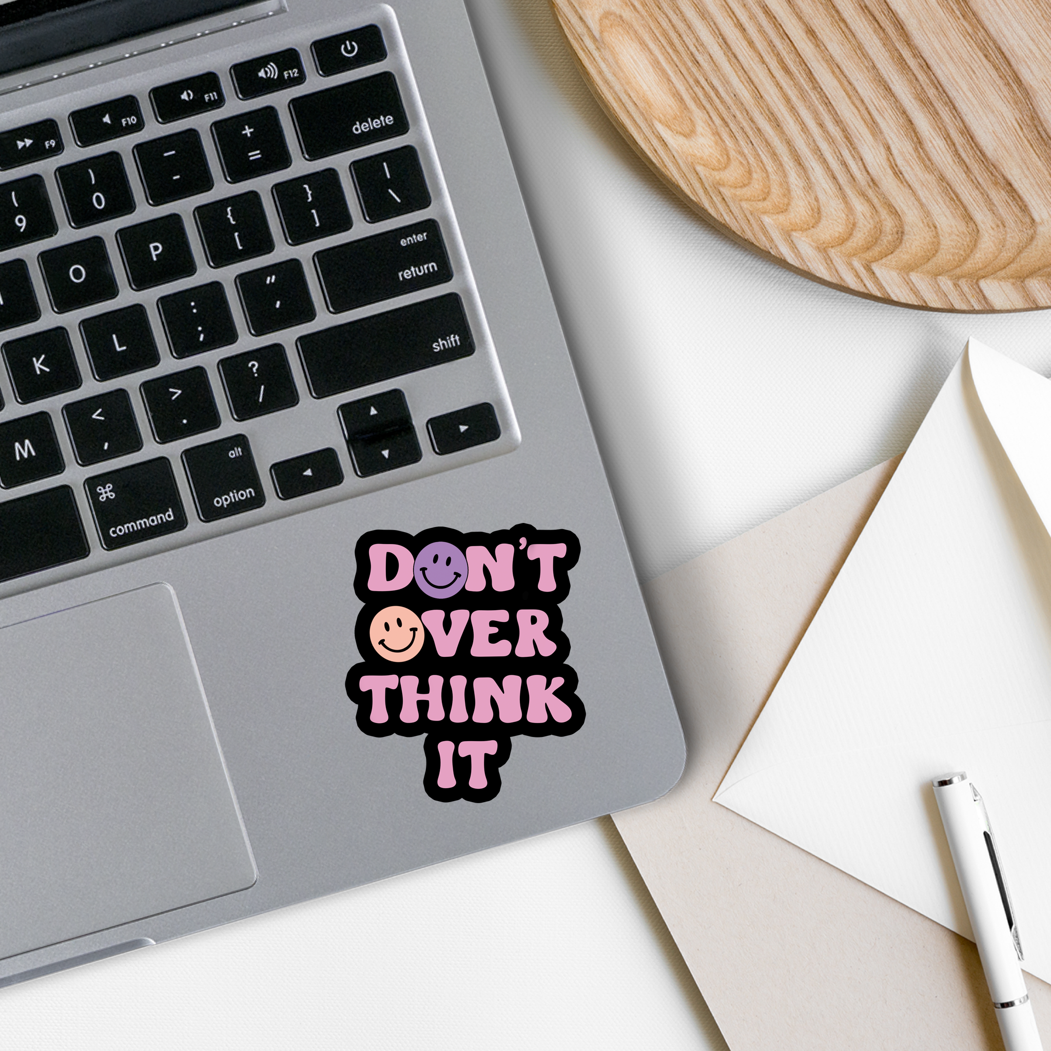 Don't Over Think It Vinyl Sticker on a white background, showcasing its matte finish and motivational design.