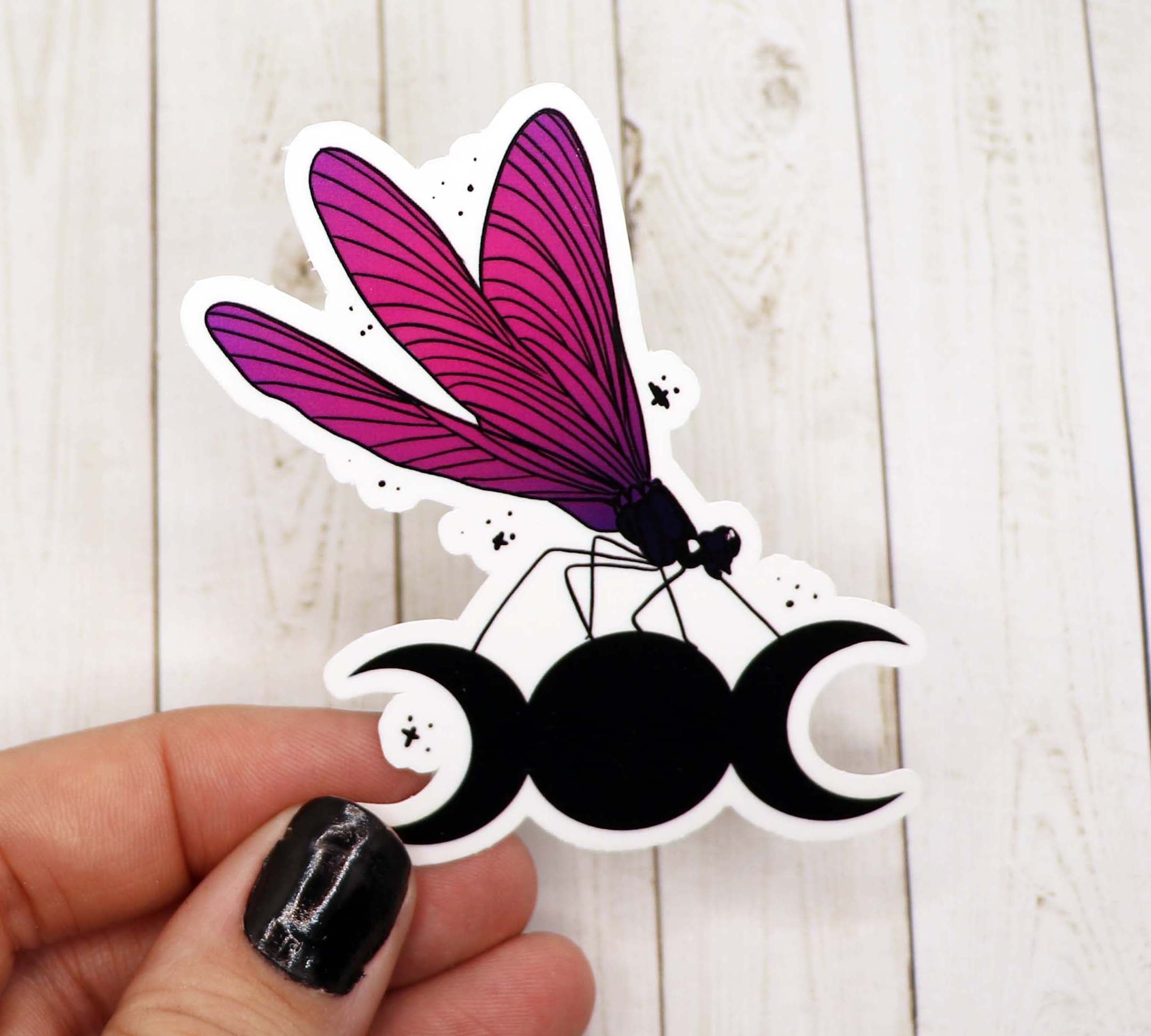 A vibrant Dragonfly Celestial Sticker featuring intricate designs on high-quality matte vinyl.