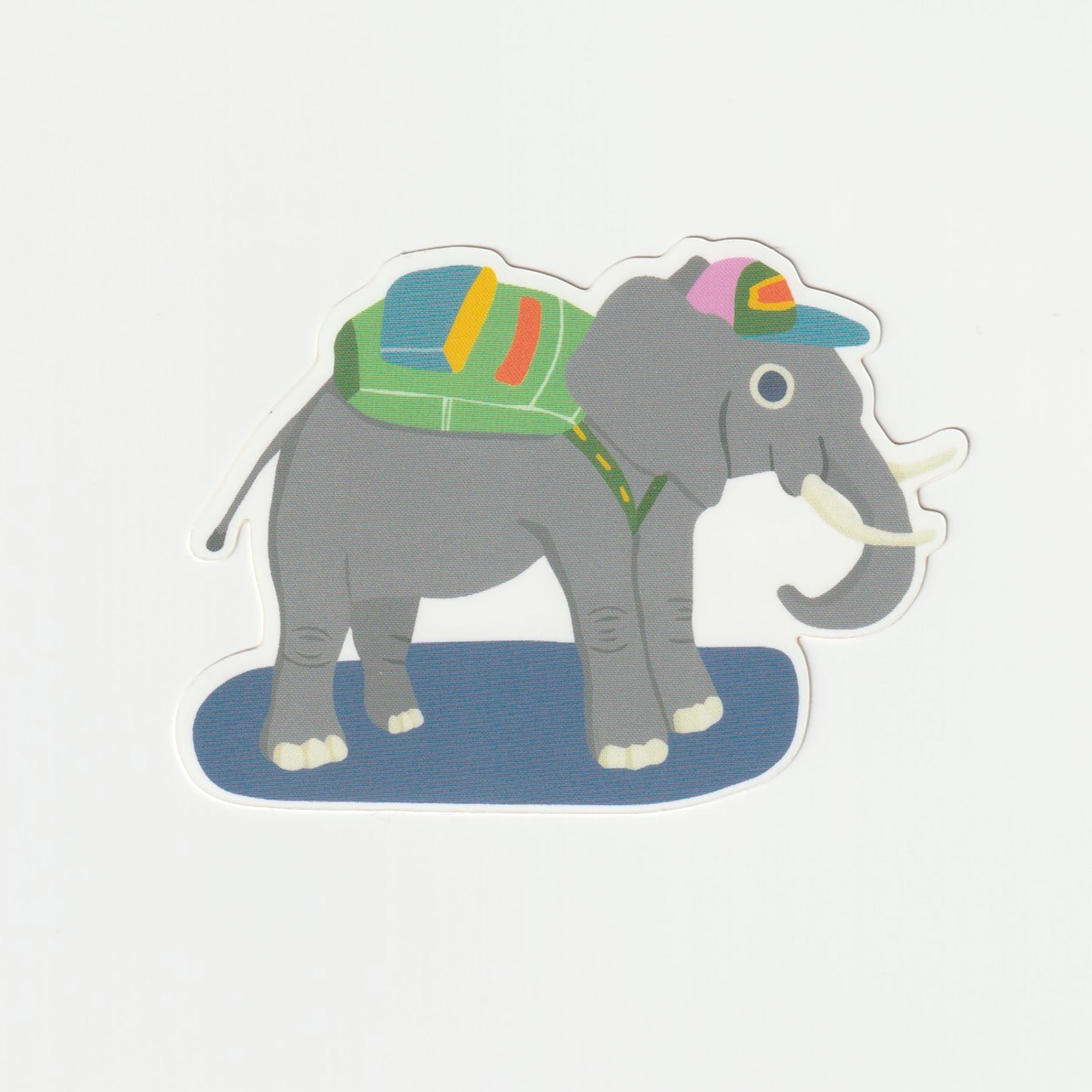 A colorful vinyl sticker featuring an elephant wearing a backpack and a hat, perfect for personalizing items.