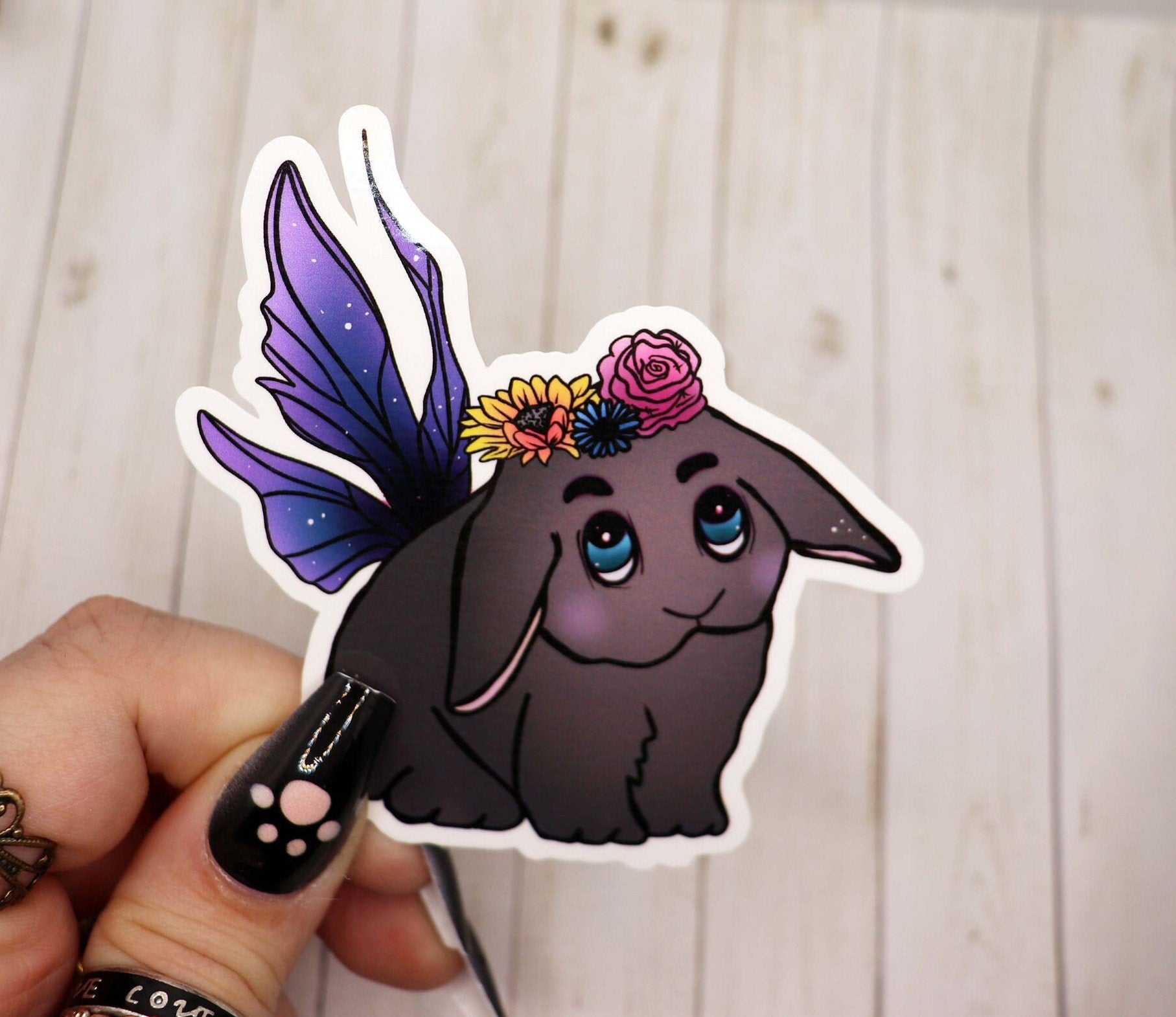 A colorful Fairy Bunny sticker featuring a whimsical bunny design with fairy wings, perfect for decorating various items.