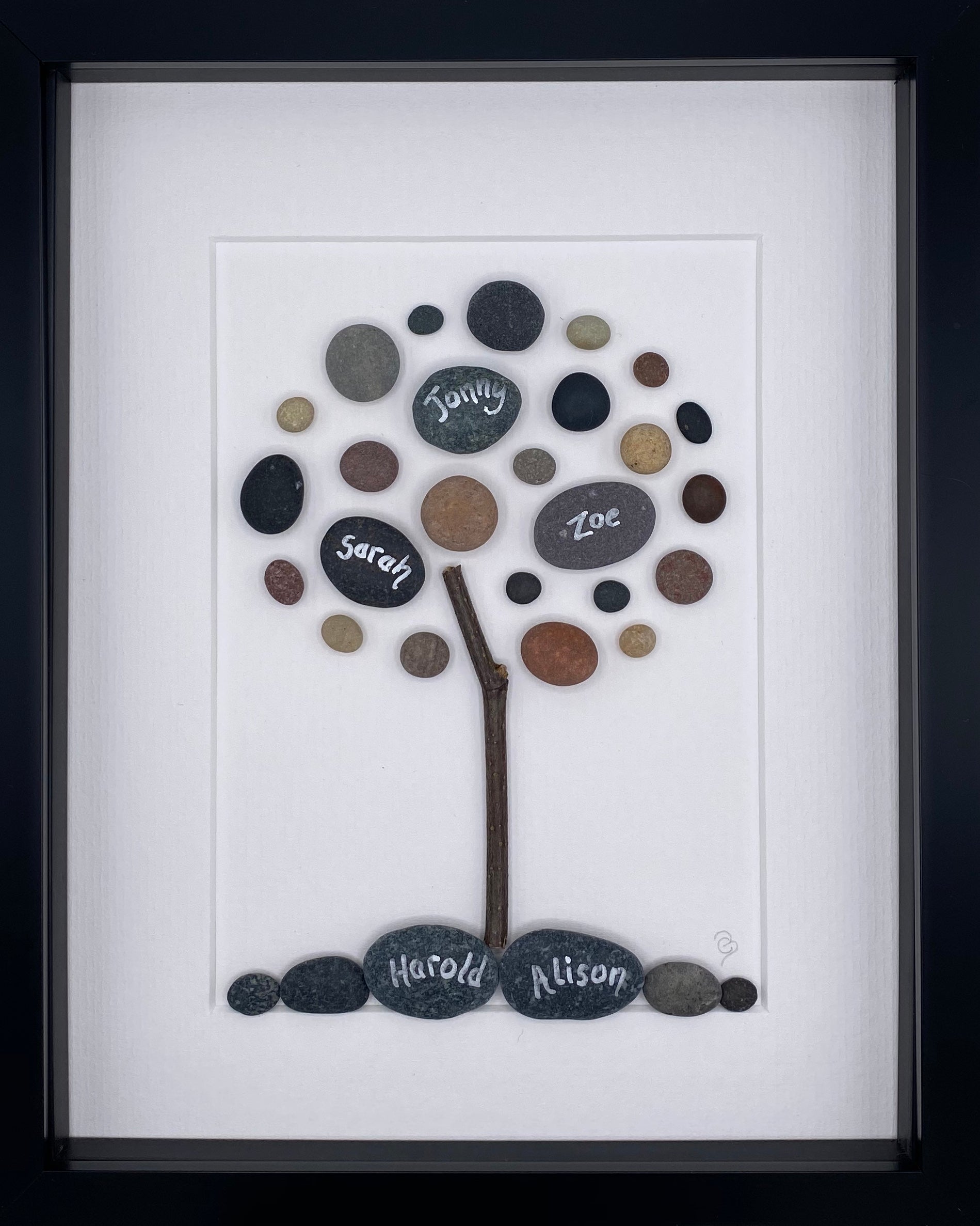 A beautifully designed Family Tree artwork featuring personalized names of family members, framed in black or white.