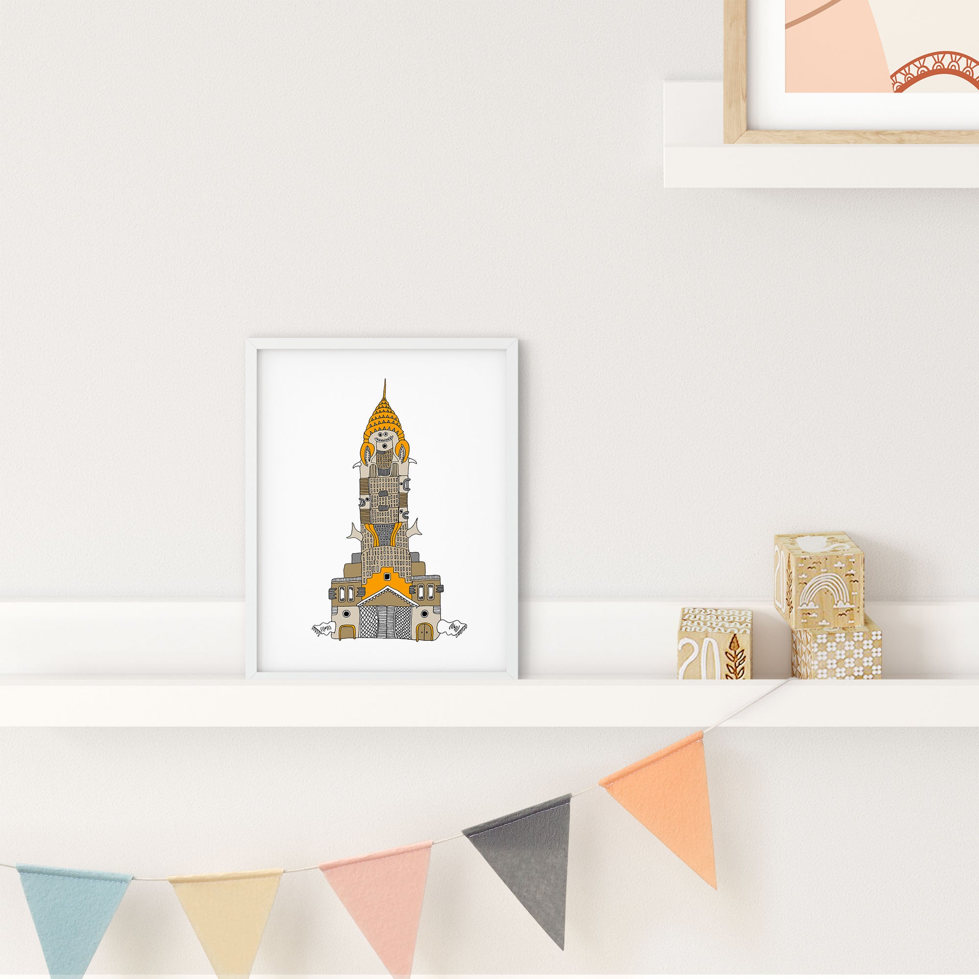 A colorful illustrated print of the Fish Chrysler Building, featuring ocean elements like shells and fins, showcasing a playful design.