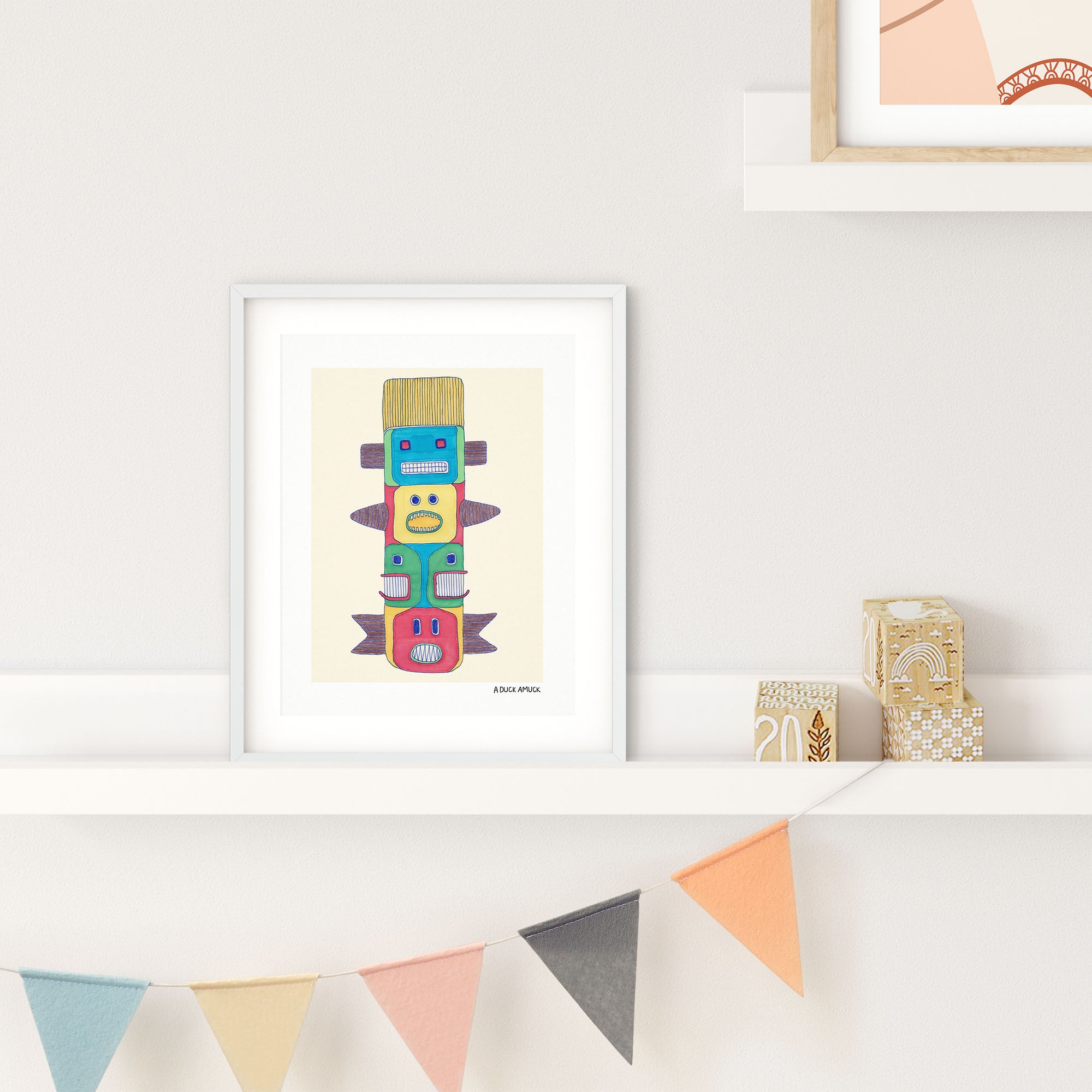 Fish Totem #2 print featuring colorful illustrated totem motifs, designed with ink and colored pencil.