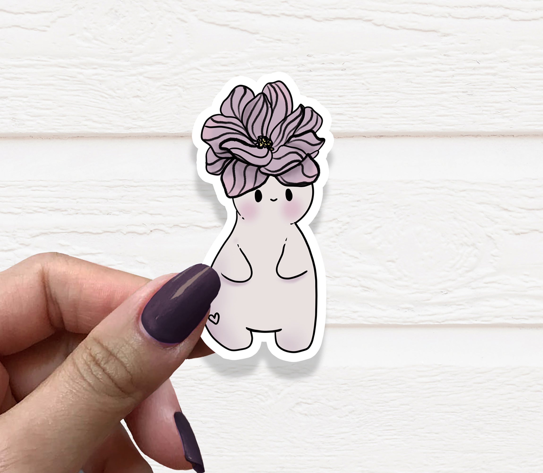 A vibrant Flower Child Vinyl Sticker featuring floral designs, perfect for personalizing various items.