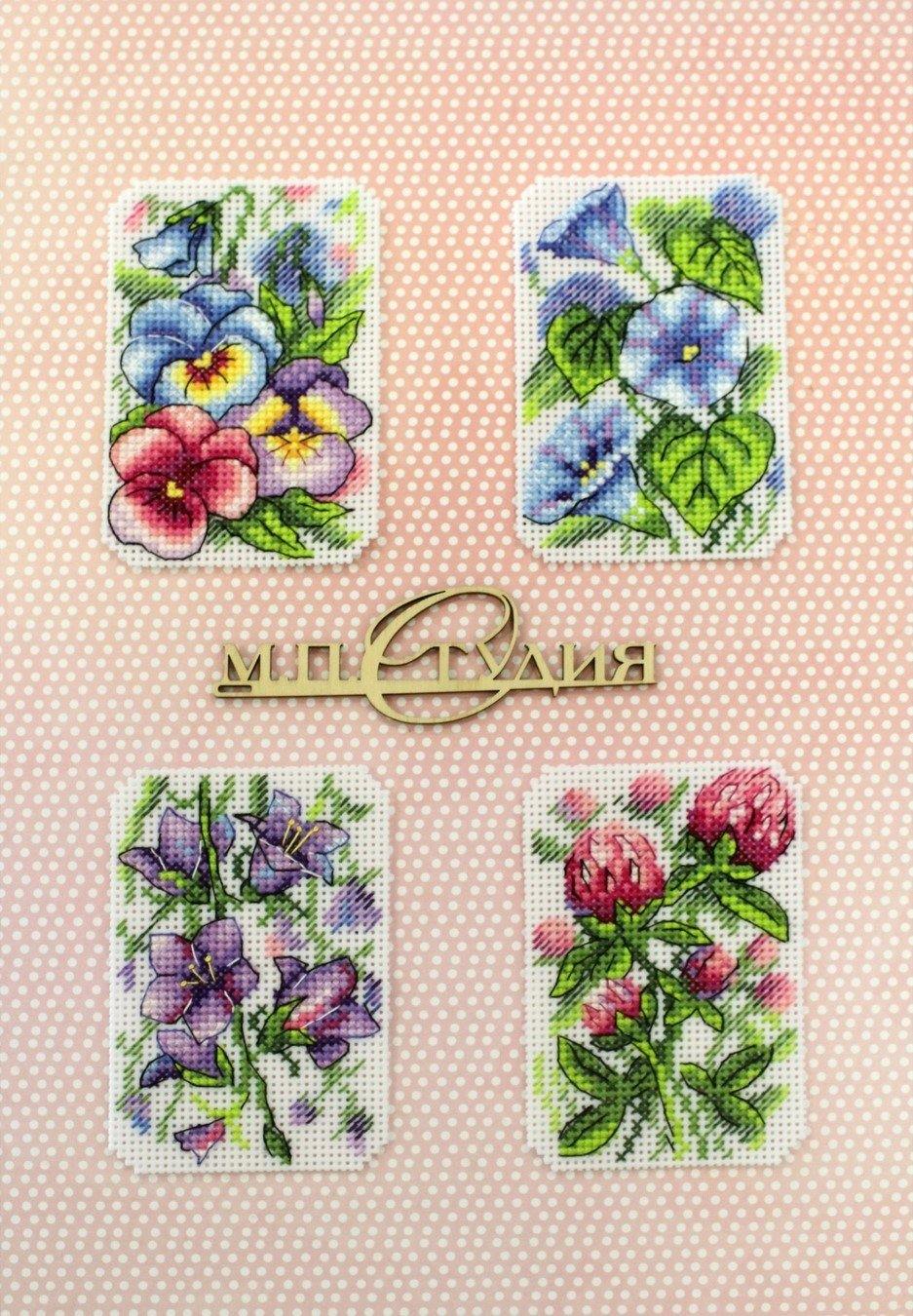 Flower Symphony P-491 / SR-491 Plastic Canvas Counted Cross Stitch Kit with threads, canvas, and instructions for DIY fridge magnets.