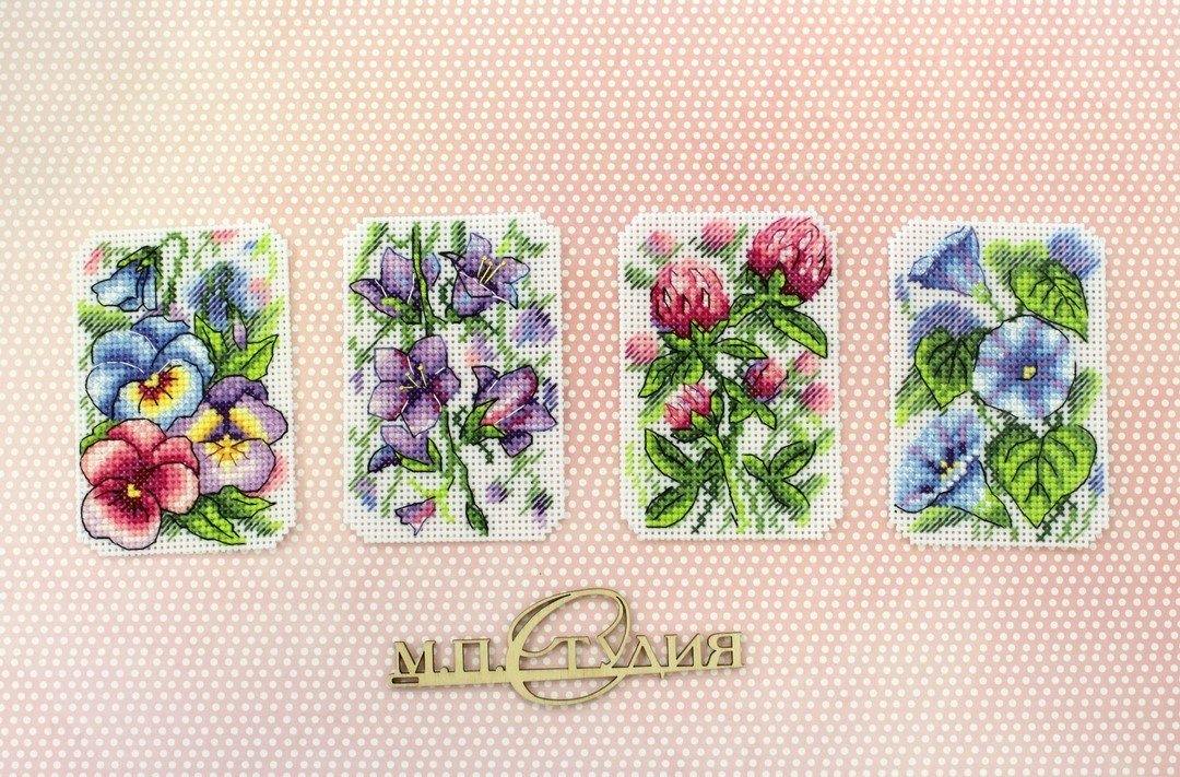 Flower Symphony P-491 / SR-491 Plastic Canvas Counted Cross Stitch Kit with threads, canvas, and instructions for DIY fridge magnets.