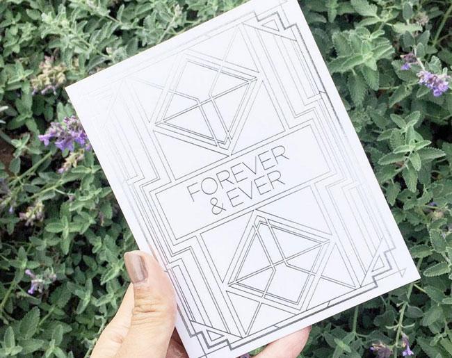 Forever & Ever greeting card with silver foil accents and matching envelope, elegantly folded with a blank interior.