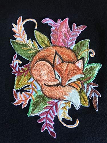 A beautifully embroidered patch featuring a watercolor fox surrounded by leaves, perfect for sewing or ironing onto garments.