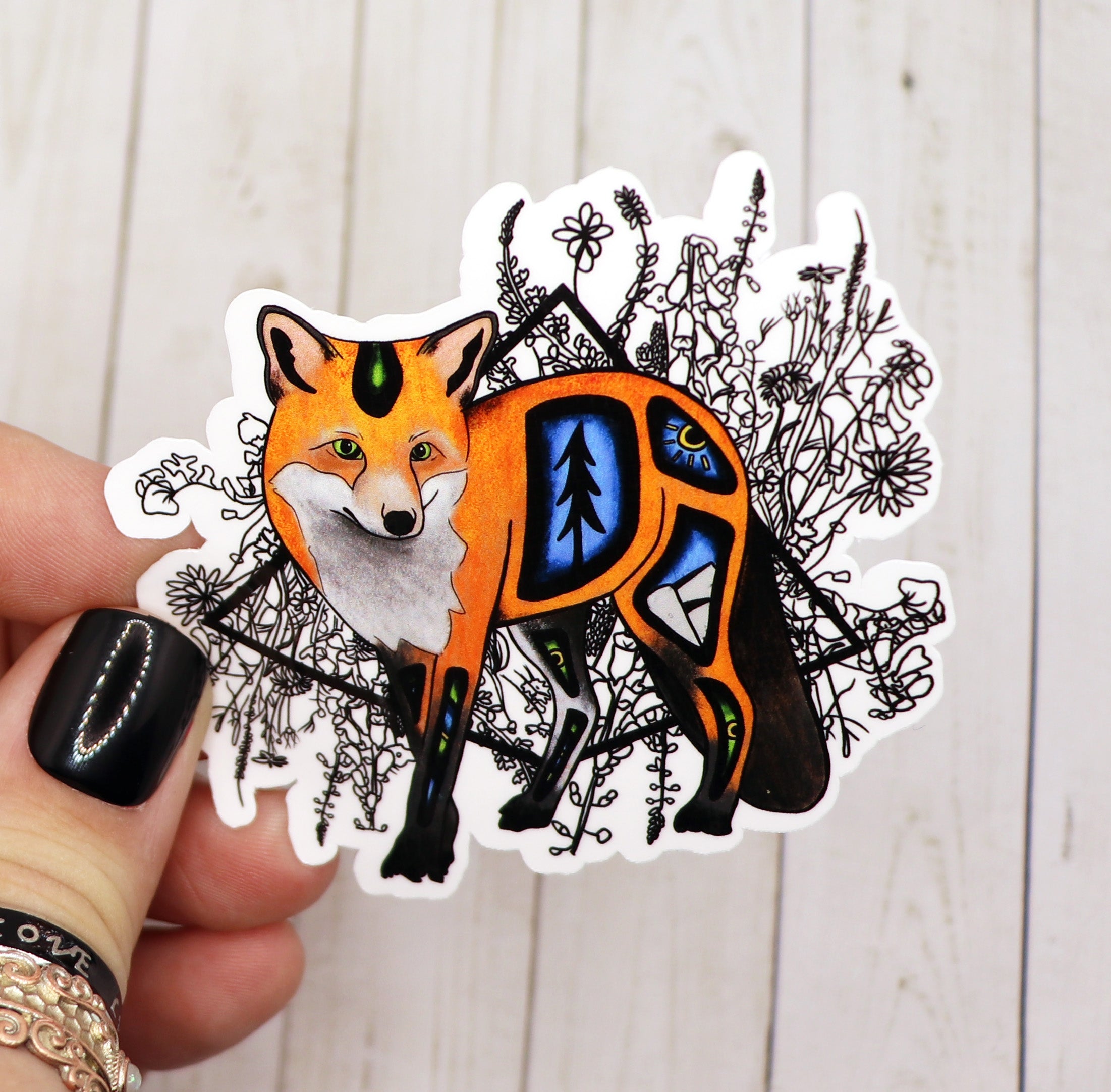 A vibrant Fox Sticker on a matte vinyl surface, showcasing its intricate design and durable finish.