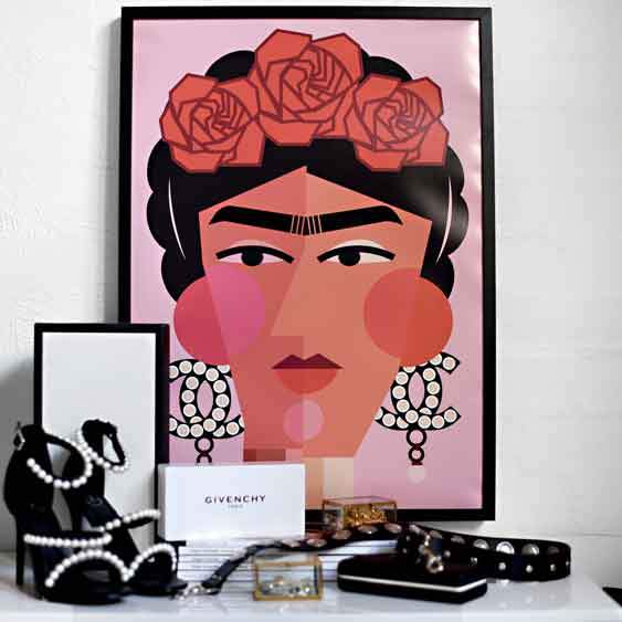 Art print of Frida Kahlo wearing Chanel, vibrant colors on high-quality stock.