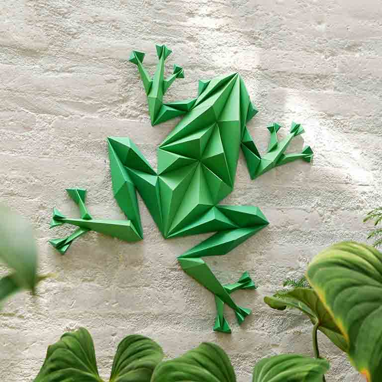 Colorful Frog Wall Art paper craft kit with pre-cut pieces, showcasing a charming frog design ready for assembly.