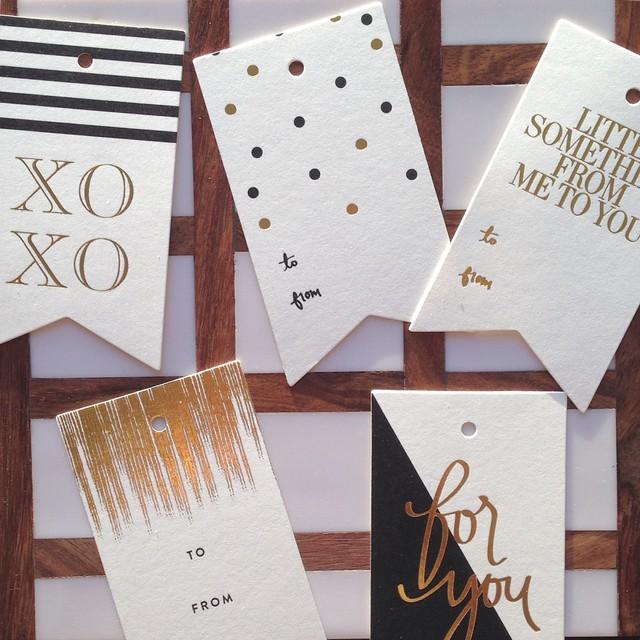 A pack of five From Me To You Tags featuring a flag shape and gold foil accents, perfect for gift wrapping.