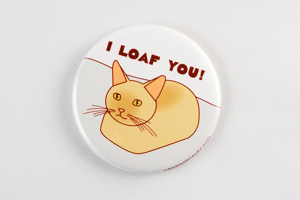 Funny cat loaf magnet or pin featuring a loafing cat and the text 'I Loaf You!' in a playful design.