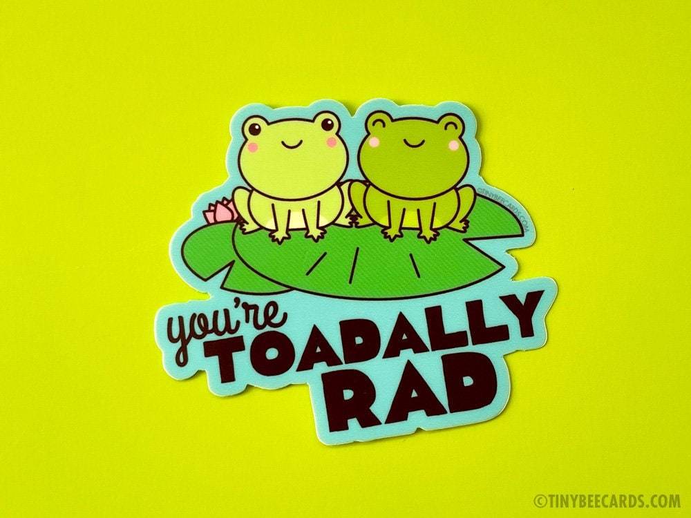 Funny Frog Vinyl Sticker featuring two froggies on lilypads with the text 'you're toadally rad!'