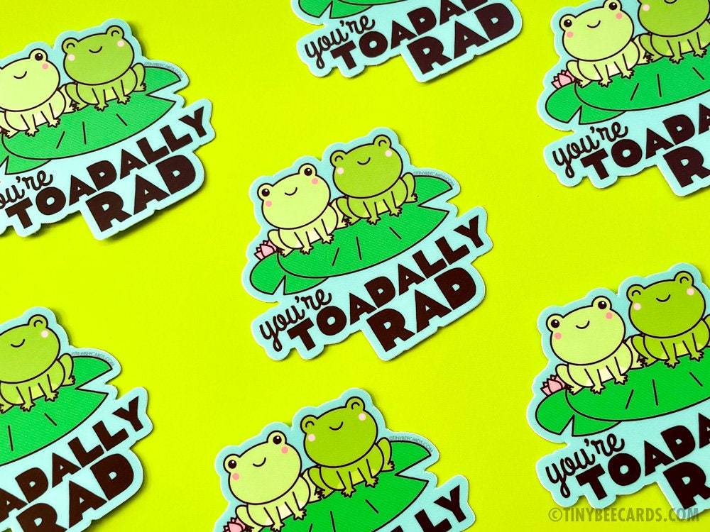 Funny Frog Vinyl Sticker featuring two froggies on lilypads with the text 'you're toadally rad!'