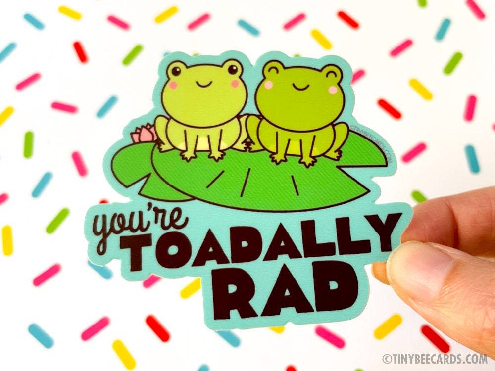 Funny Frog Vinyl Sticker featuring two froggies on lilypads with the text 'you're toadally rad!'