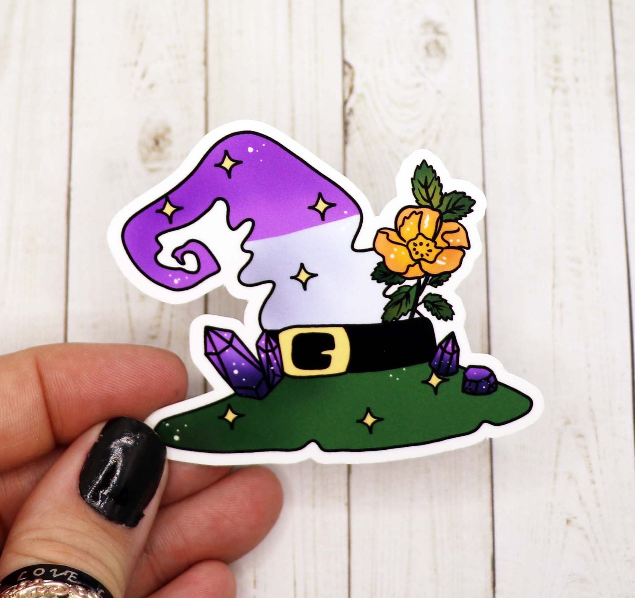 Colorful Genderqueer Pride Witch Hat Sticker on a white background, showcasing vibrant colors and a unique design.