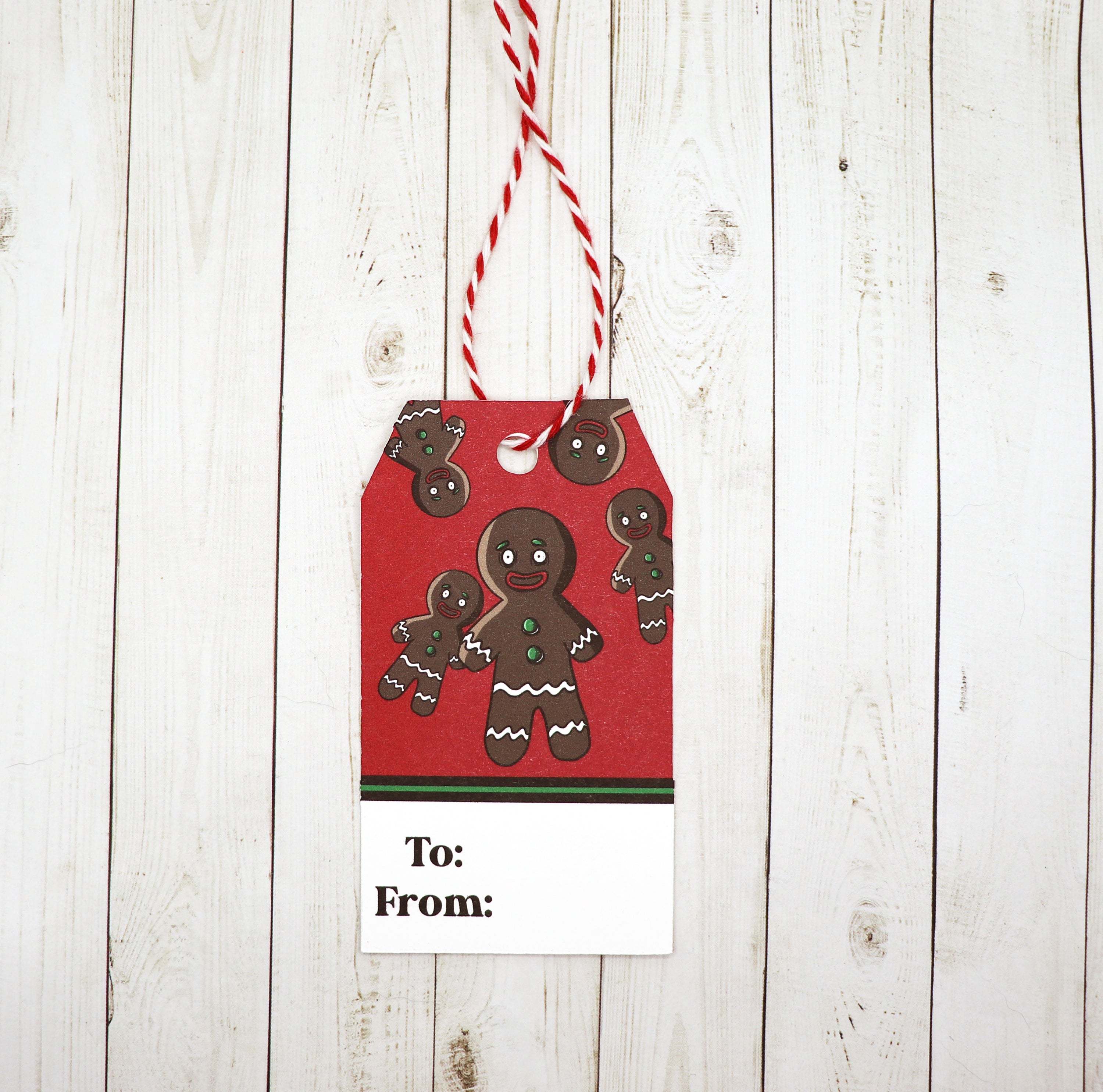 A set of eight gingerbread gift tags with red and white twine, printed on heavy white cardstock, perfect for any occasion.