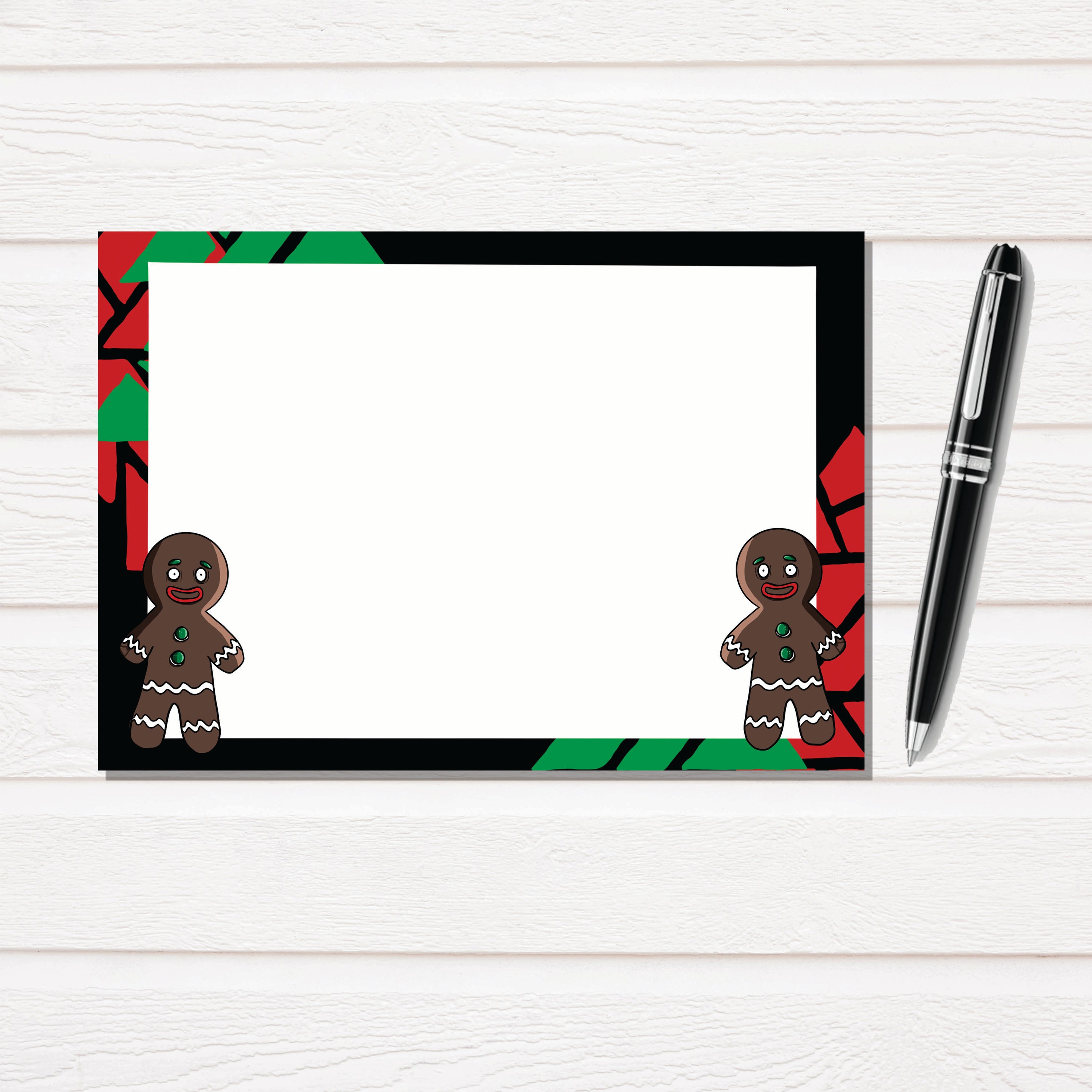 Gingerbread Man Notecard Stationary Set featuring 12 illustrated notecards and matching envelopes in a clear box.