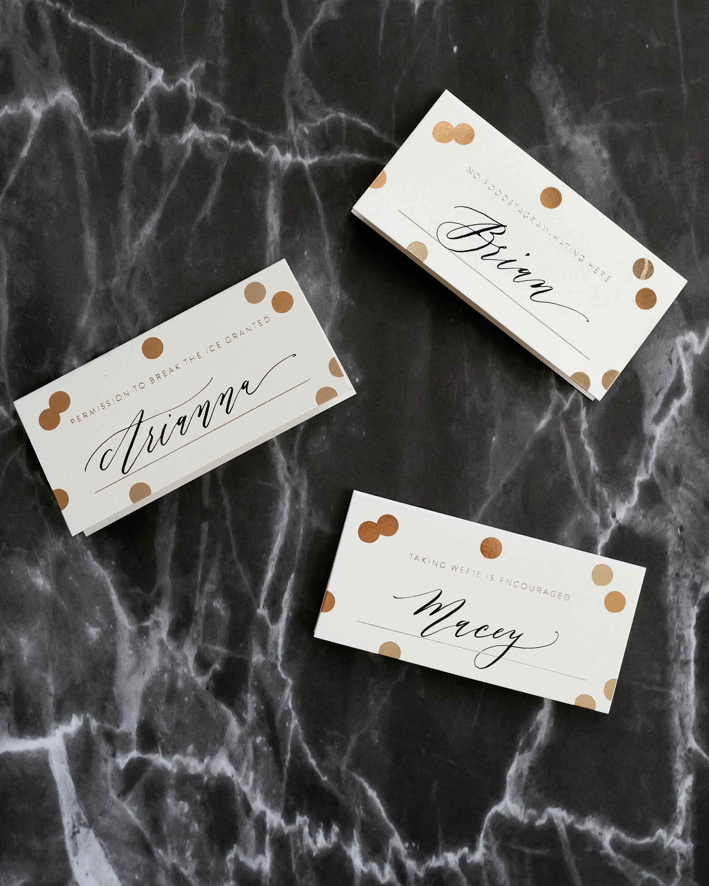 A set of 8 Gold Confetti Place Cards featuring elegant gold foil accents and unique designs, perfect for weddings and parties.