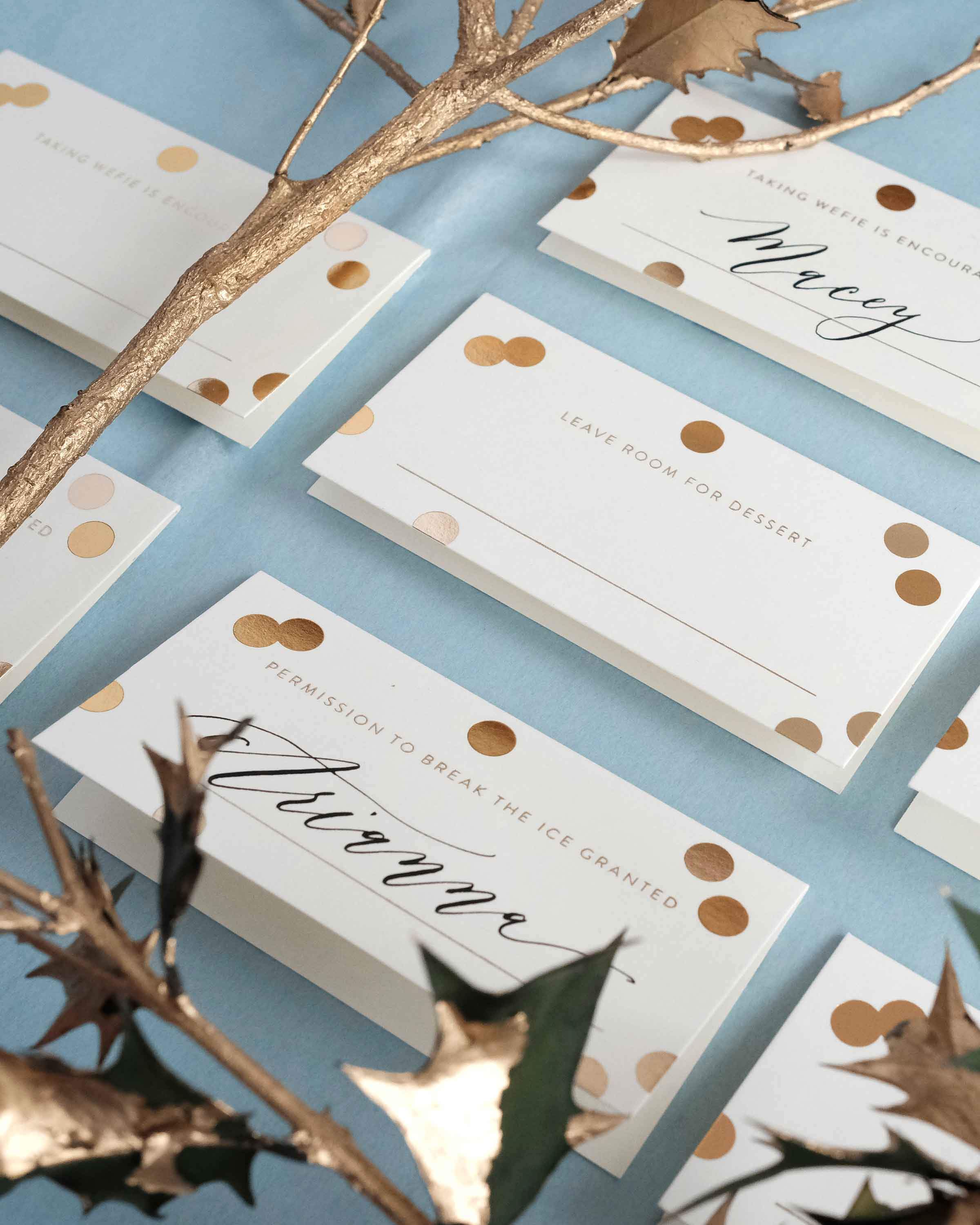 A set of 8 Gold Confetti Place Cards featuring elegant gold foil accents and unique designs, perfect for weddings and parties.