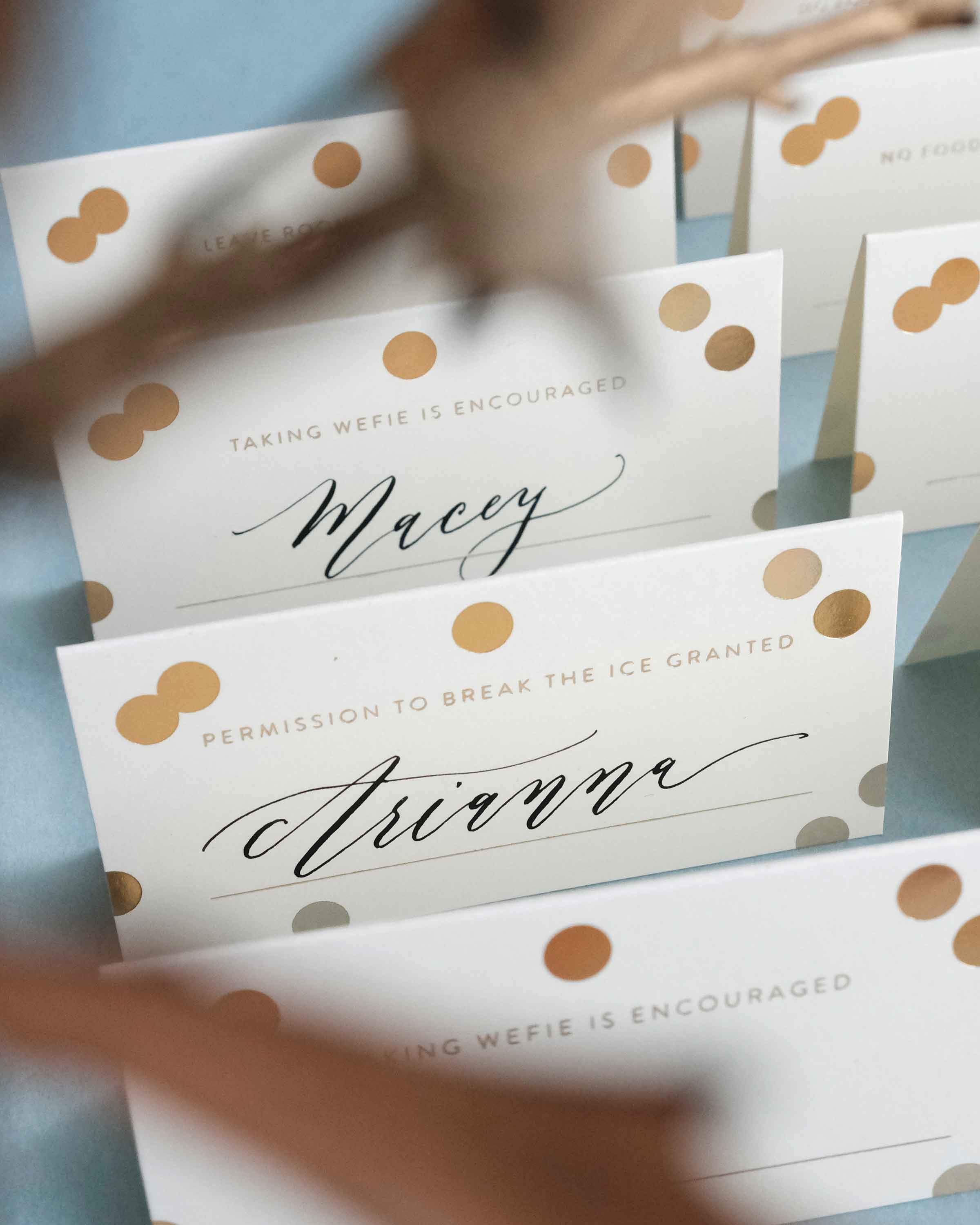 A set of 8 Gold Confetti Place Cards featuring elegant gold foil accents and unique designs, perfect for weddings and parties.