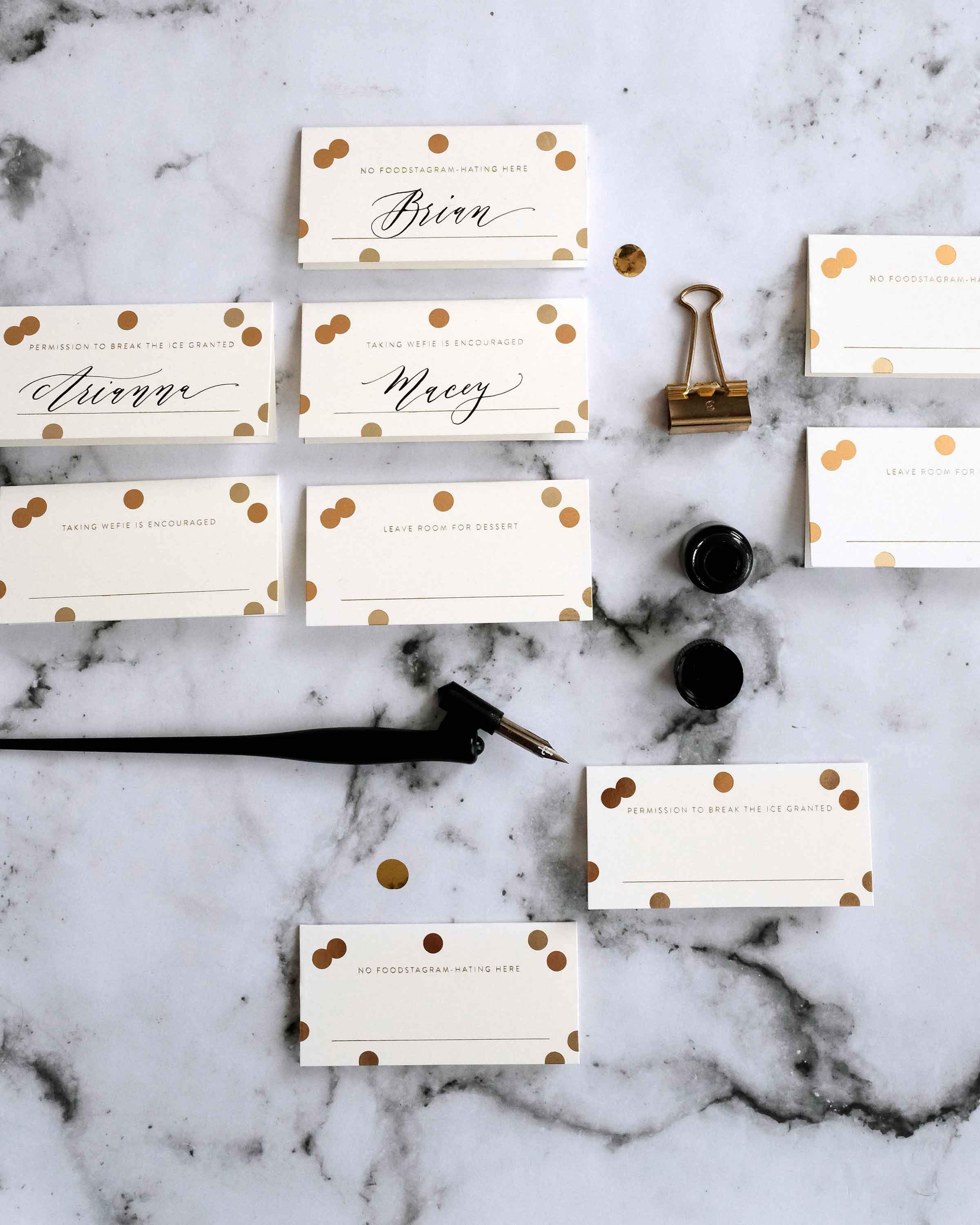 A set of 8 Gold Confetti Place Cards featuring elegant gold foil accents and unique designs, perfect for weddings and parties.