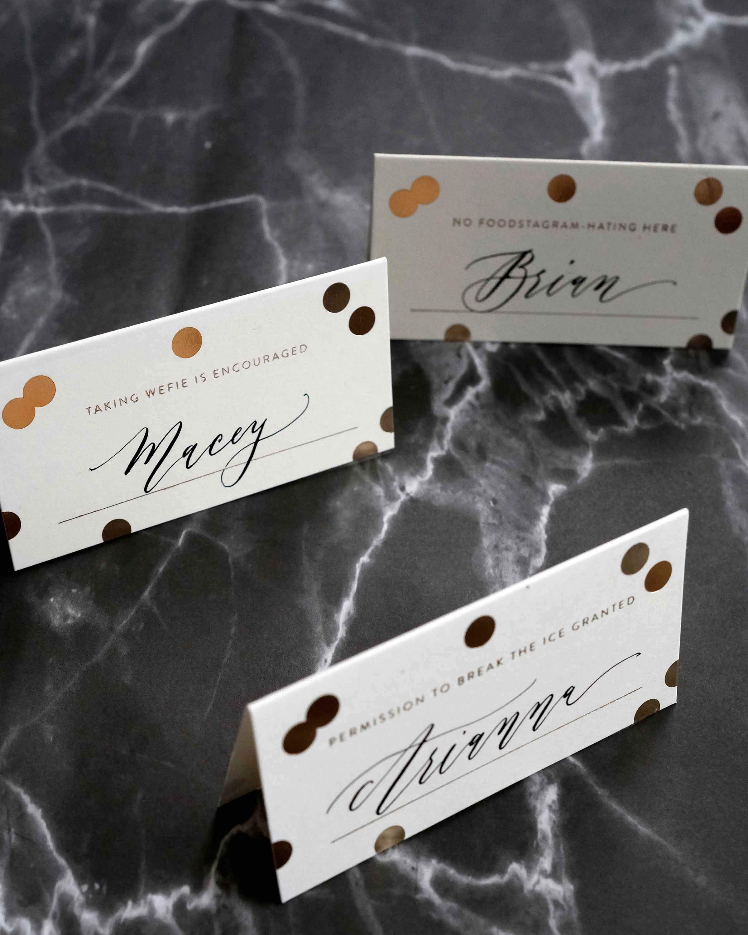 A set of 8 Gold Confetti Place Cards featuring elegant gold foil accents and unique designs, perfect for weddings and parties.