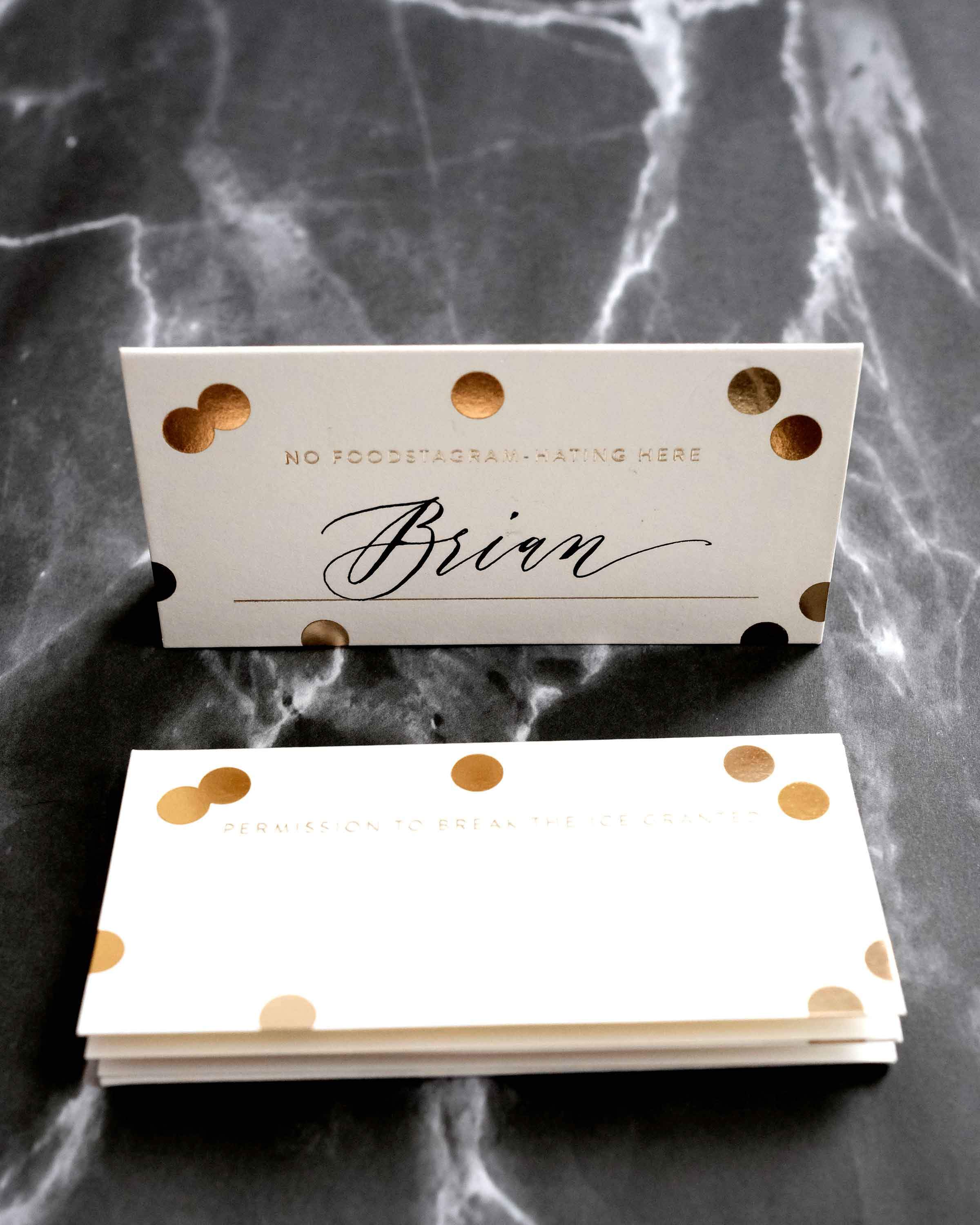 A set of 8 Gold Confetti Place Cards featuring elegant gold foil accents and unique designs, perfect for weddings and parties.