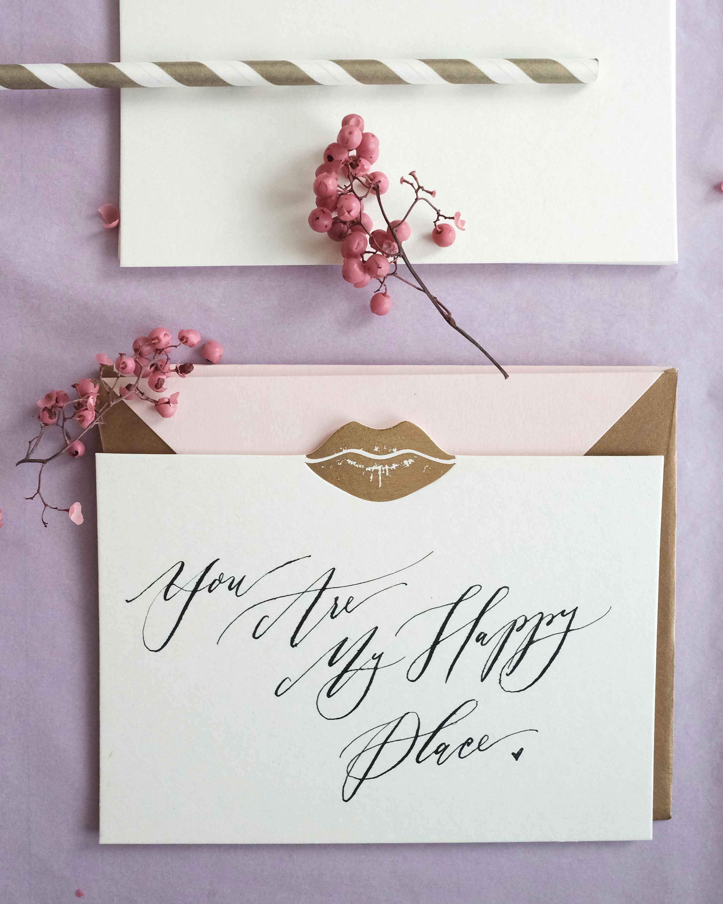 Set of Gold Kiss Notecards featuring gold foil accents and lined envelopes.